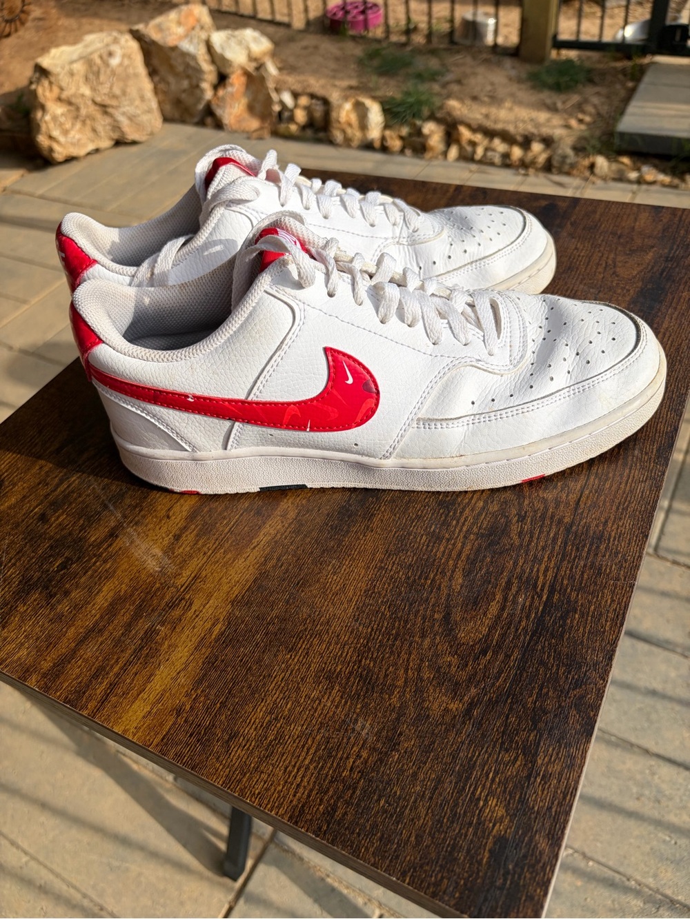 Nike White Low-Top Sneakers with Red Swoosh